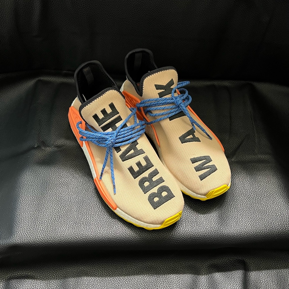 Tan Sneakers with Blue Laces and Orange Accents